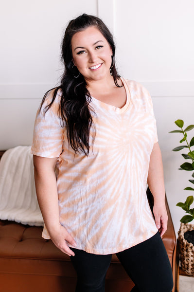 Spin Me Round Spiral V Neck Tee in Orange Cream